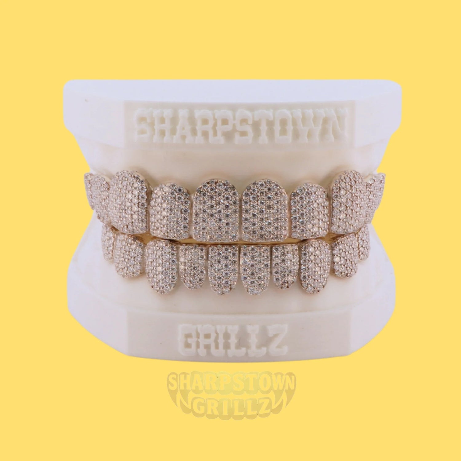 Silver 925 iced-out full set teeth caps with brilliant round micro pave stones.