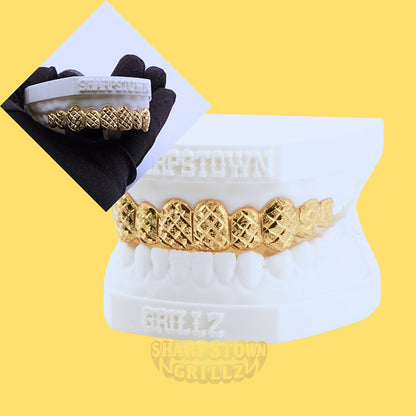 Custom-made upper diamond cut diamond dust teeth grillz available in Silver 925 and 10K Gold.