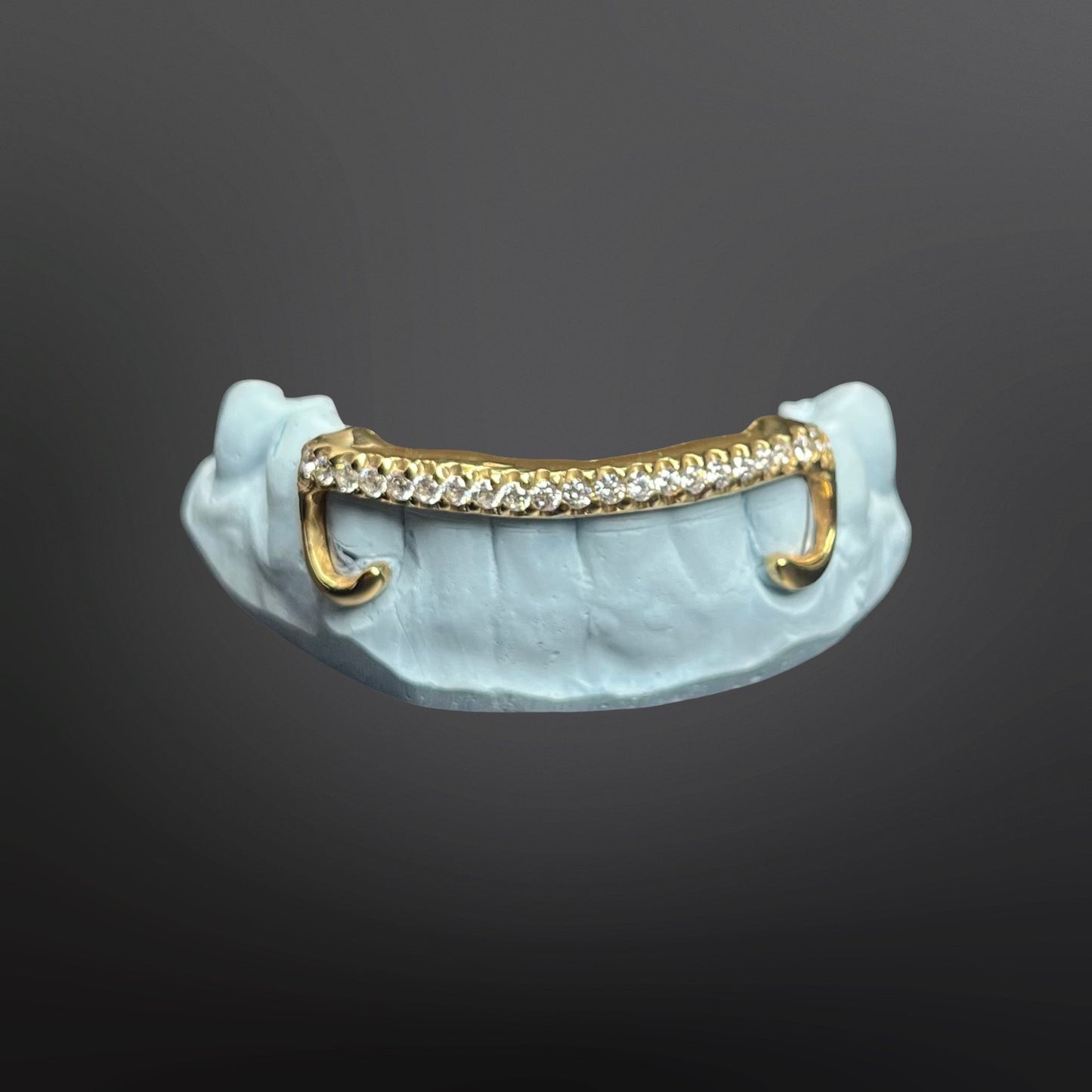 Custom iced out gap bar grillz in 10K gold on mold