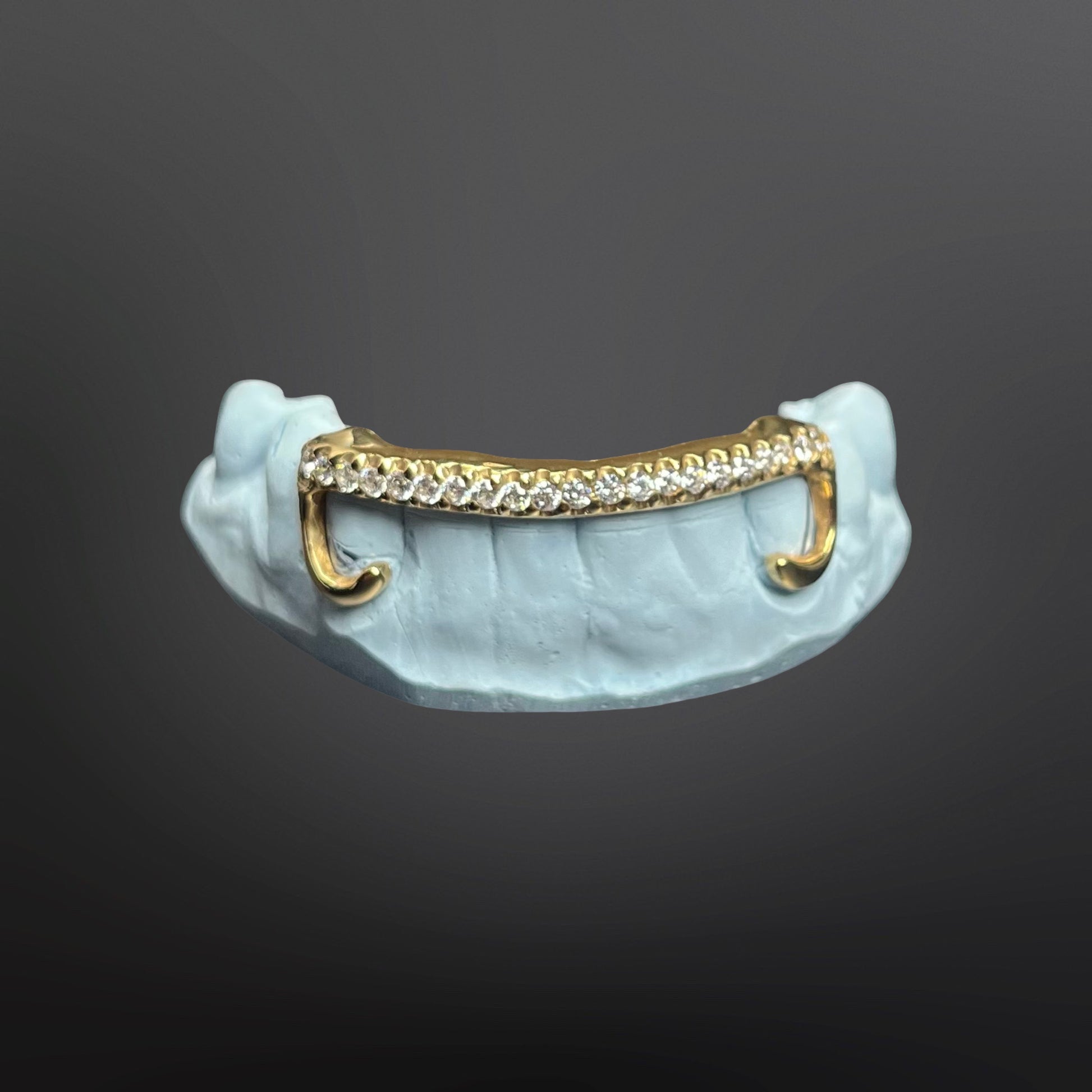 Custom iced out gap bar grillz in 10K gold on mold