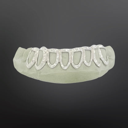 Set of dental teeth on a dark gray background