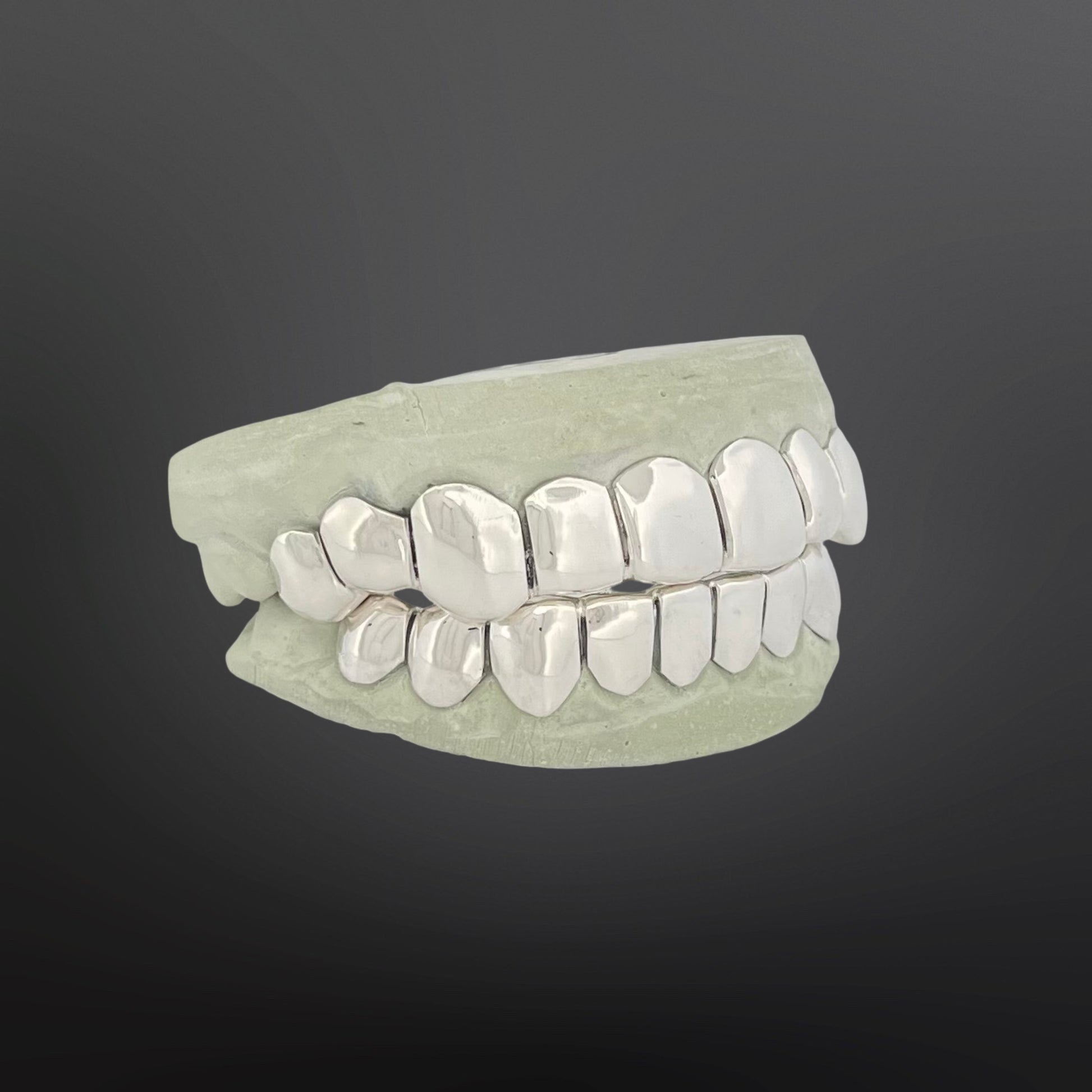 Custom solid 925 sterling silver grillz top and bottom full mouth set on dental mold
