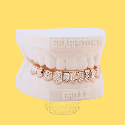 Full mouth iced-out custom teeth caps in Silver 925 with micro pave setting.